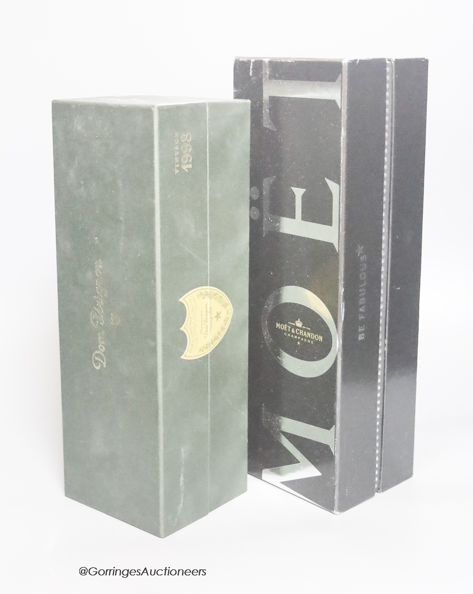 A bottle of 1998 Dom Perignon champagne, in a sealed presentation box and a bottle of Moet Chandon 'diamond' champagne, boxed